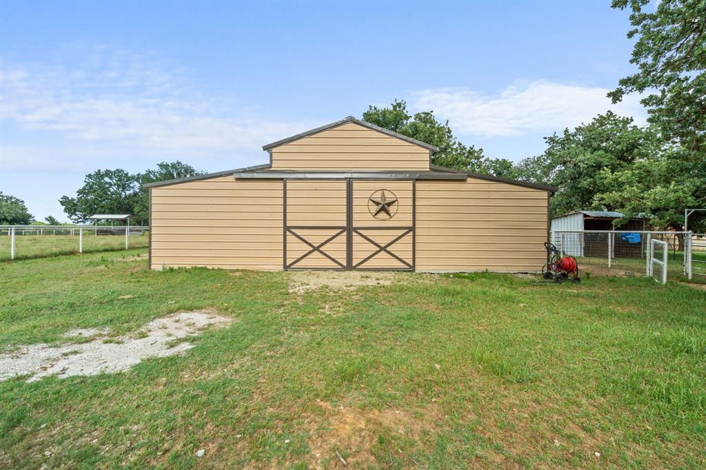175 Porter Road Bartonville, TX 76226 - Photo 37 of 40 a view of a backyard with a garden and entertaining space