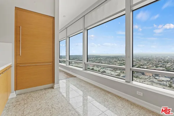 a view of a large window with an outdoor space