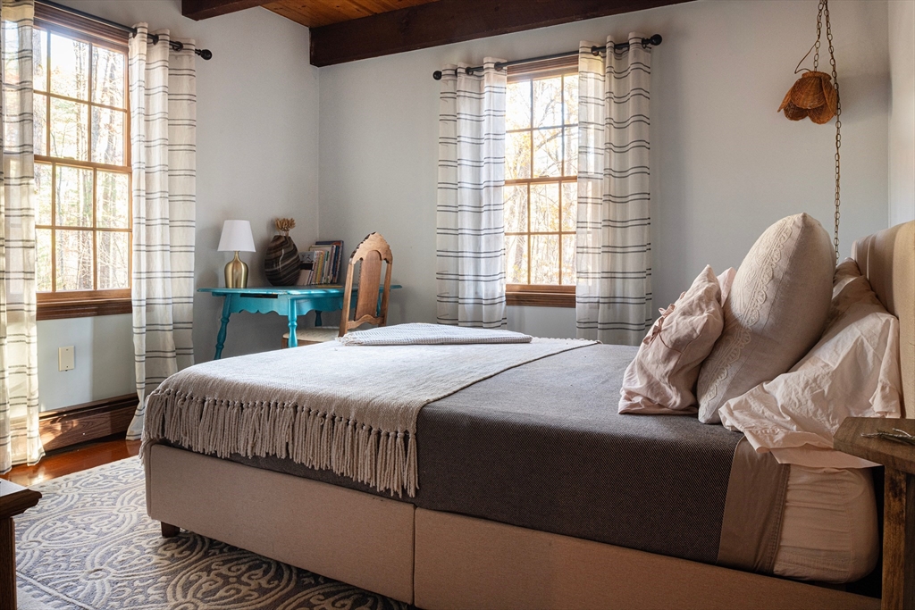 5 June Street Pepperell, MA 01463 - Photo 13 of 31 a bedroom with a bed and window