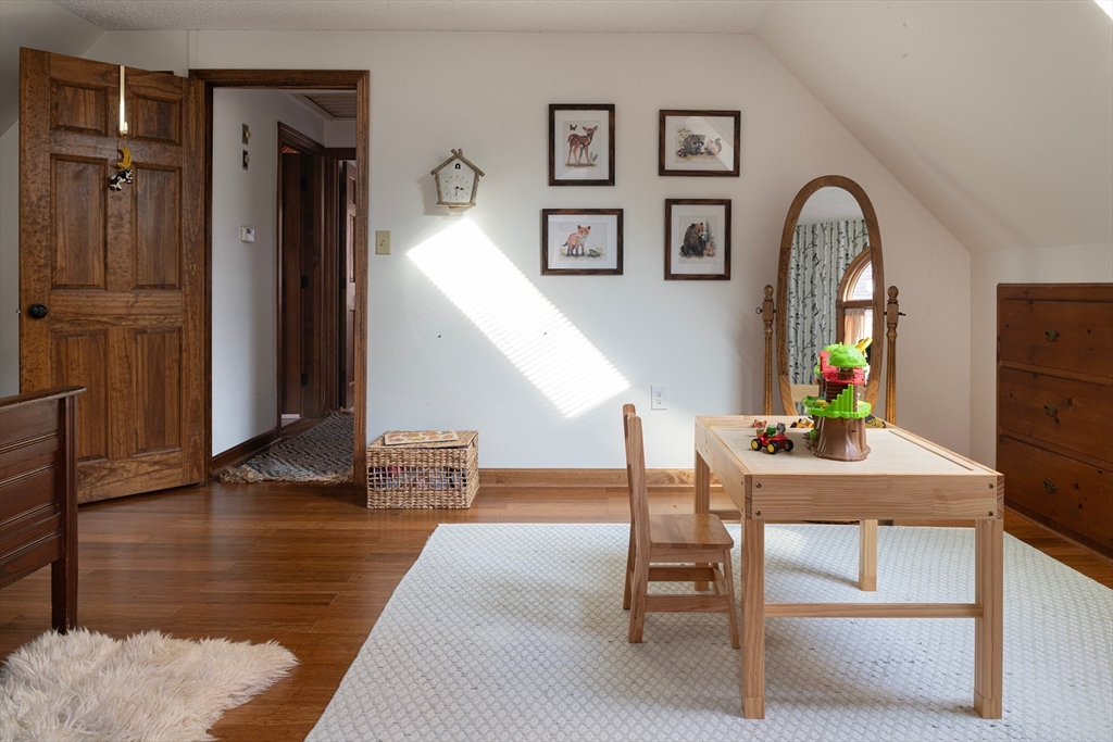 5 June Street Pepperell, MA 01463 - Photo 16 of 31 a view of living room with furniture and wooden floor