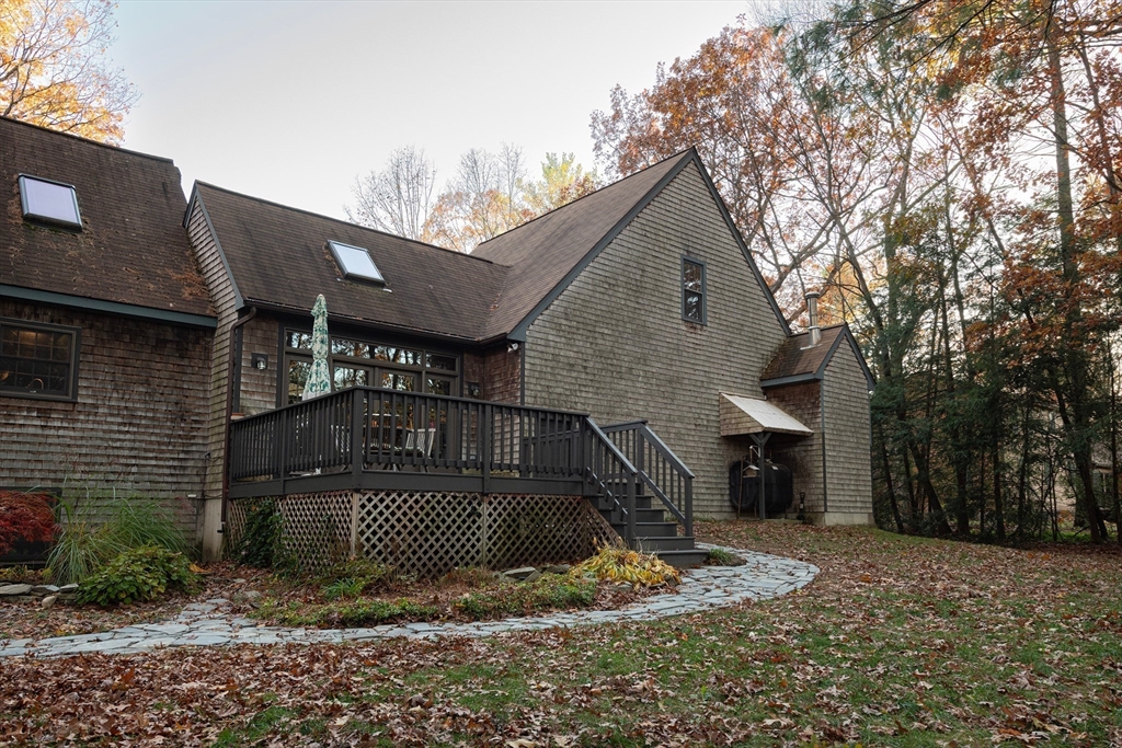 5 June Street Pepperell, MA 01463 - Photo 25 of 31 a front view of a house with a yard
