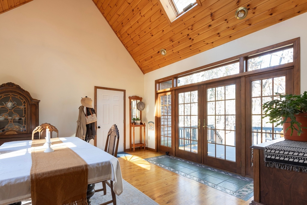 5 June Street Pepperell, MA 01463 - Photo 5 of 31 a spacious bedroom with a bed and a table chair