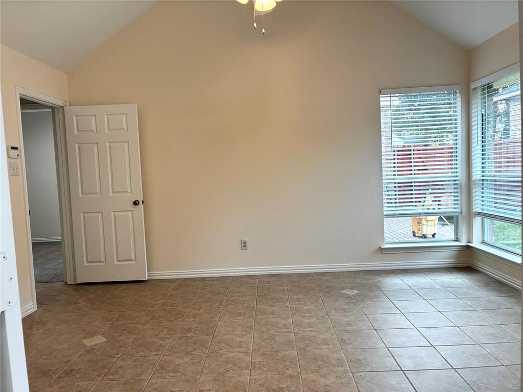 7936 Tournament Road Frisco, TX 75035 - Photo 18 of 28 a view of an empty room with a window