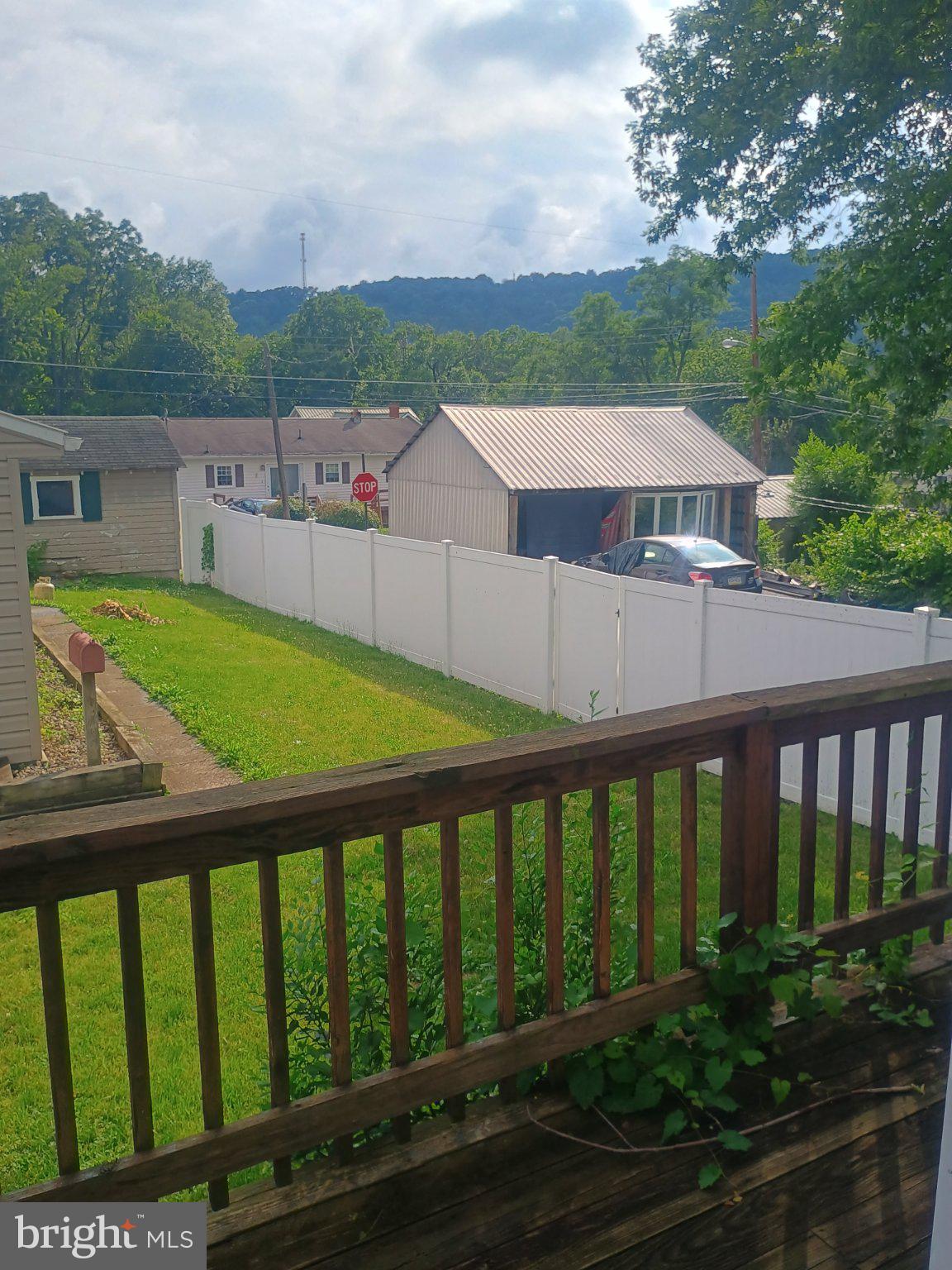 306 Ridgley Street Orbisonia, PA 17243 - Photo 3 of 21 Charming backyard with mountain views.