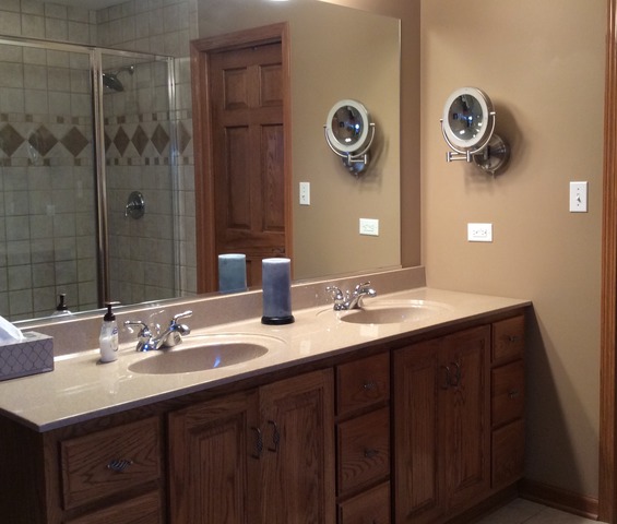 2076 Wiley Ridge Road Kankakee, IL 60901 - Photo 20 of 25 a bathroom with a sink and a mirror
