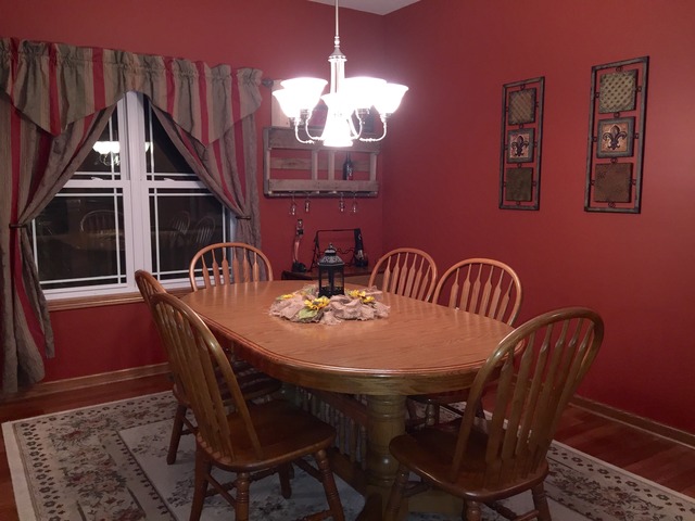 2076 Wiley Ridge Road Kankakee, IL 60901 - Photo 9 of 25 a view of a dining room with furniture and wooden floor
