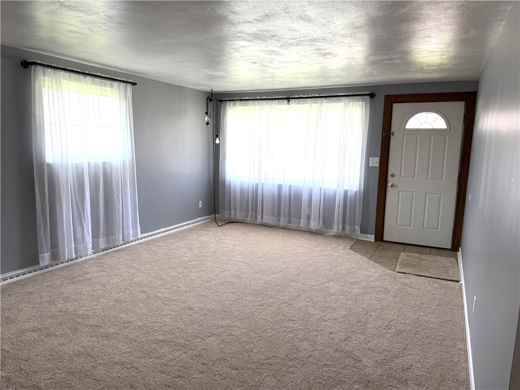 4732 Lehigh Drive Springfield, OH 45503 - Photo 25 of 27 This inviting living space features natural light, creating a bright and airy atmosphere.