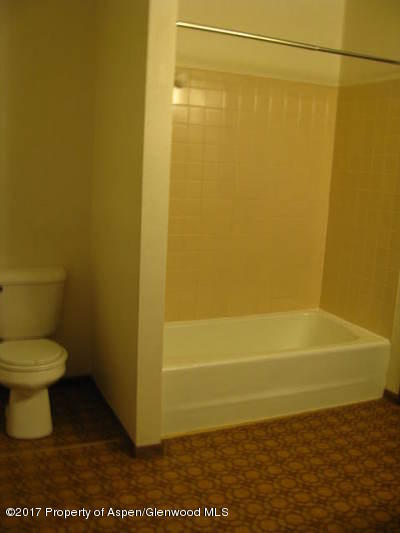 992 Wamsley Way Rifle, CO 81650 - Photo 10 of 10 a bathroom with a toilet and a shower