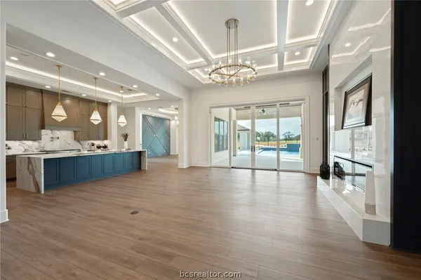 a room with cabinets and wooden floor