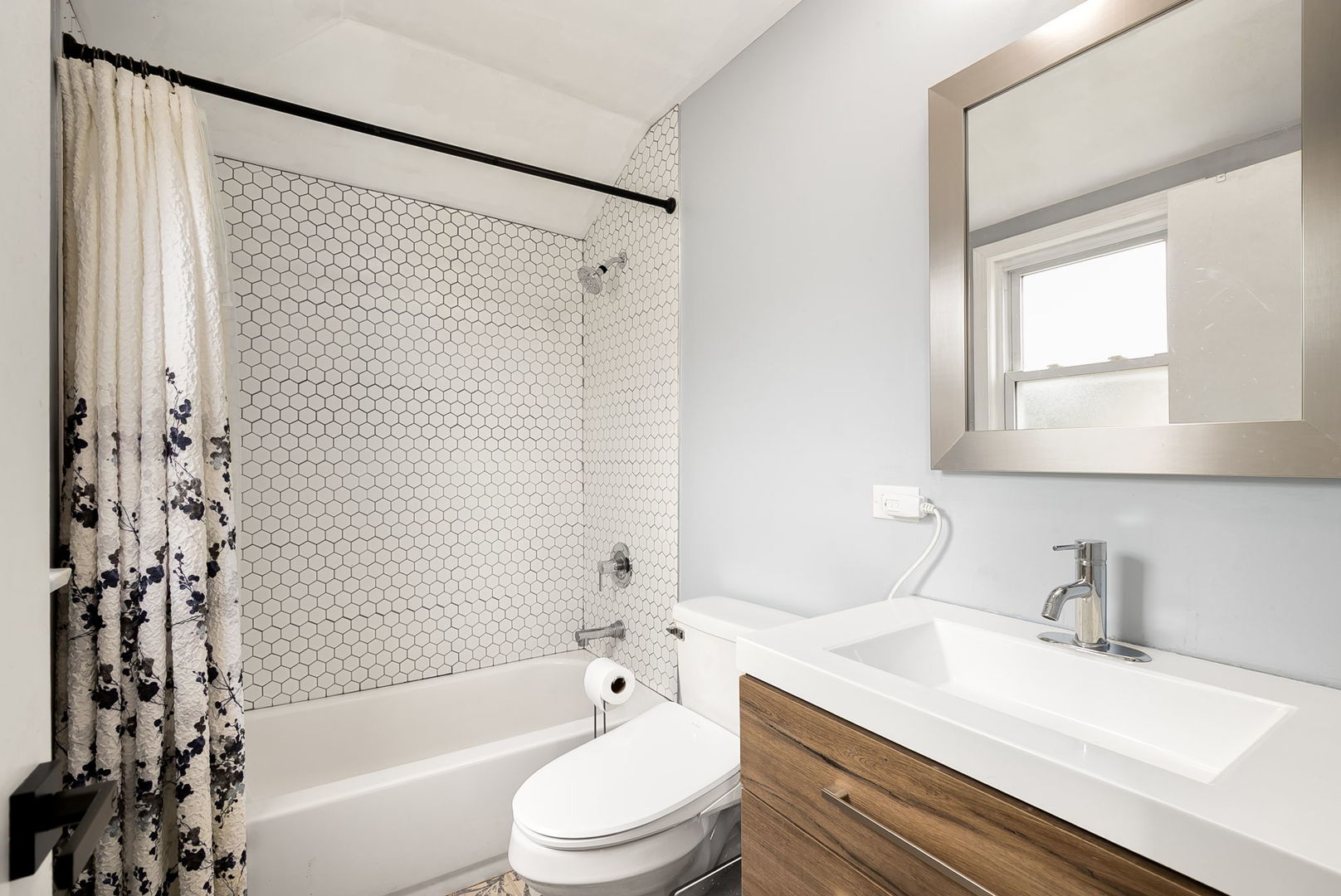 4237 Park Avenue Brookfield, IL 60513 - Photo 13 of 20 a bathroom with a sink a toilet and shower