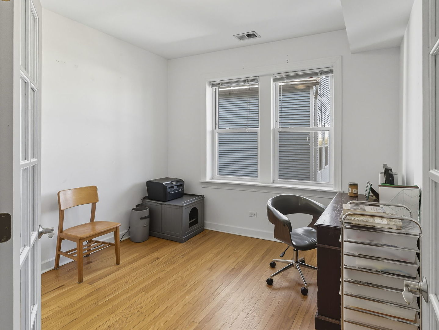 3222 West Berteau Avenue, Unit 2 Chicago, IL 60618 - Photo 9 of 16 a living room with furniture and a window