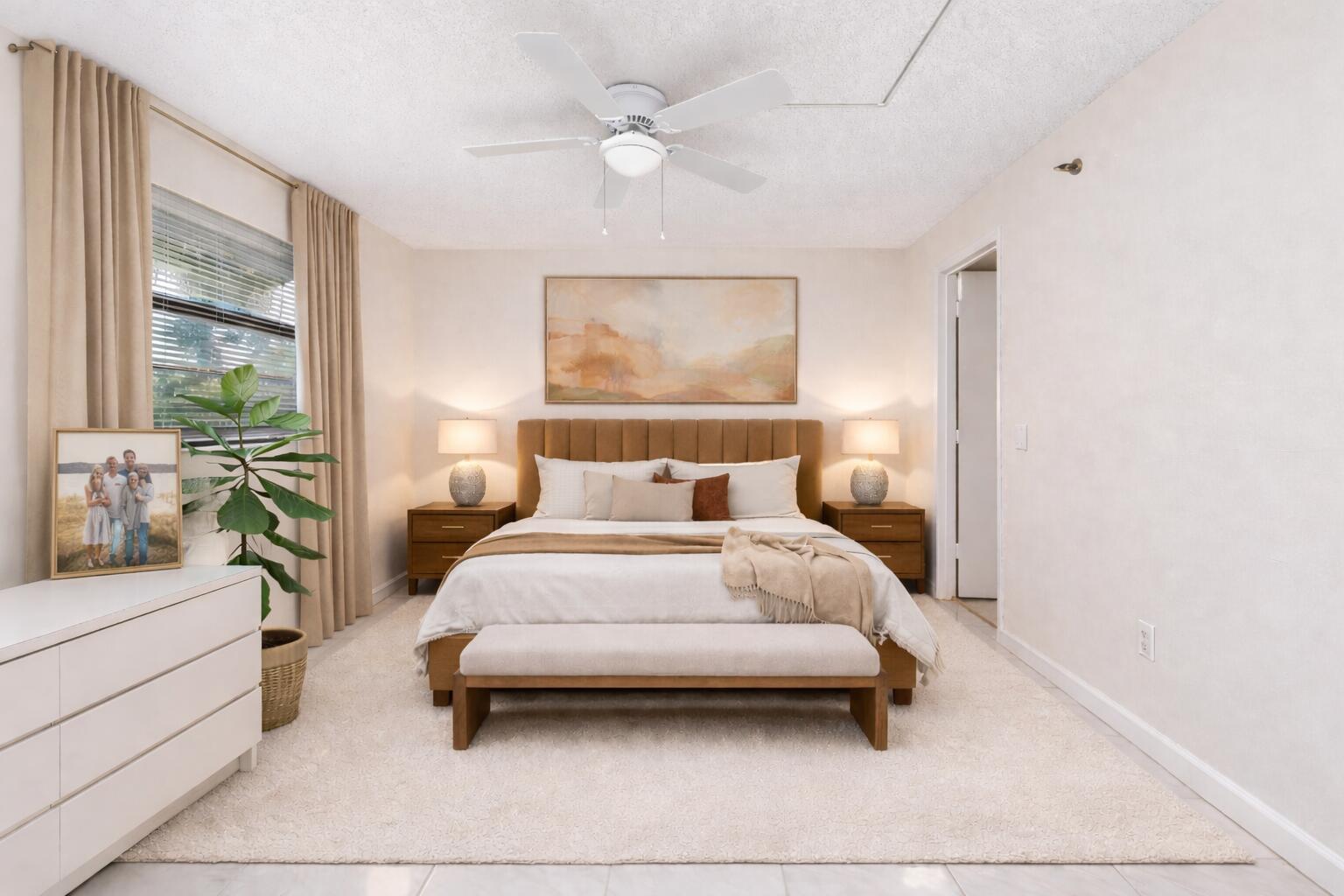 9220 Southwest 14th Street, Unit 3208 Boca Raton, FL 33428 - Photo 12 of 43 a bedroom with a bed a couch and potted plant with the outer view