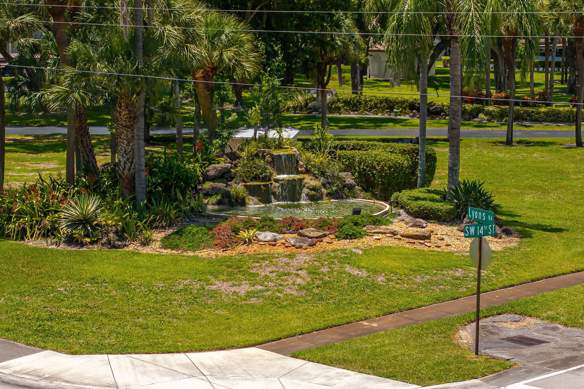 9220 Southwest 14th Street, Unit 3208 Boca Raton, FL 33428 - Photo 27 of 43 a view of a yard