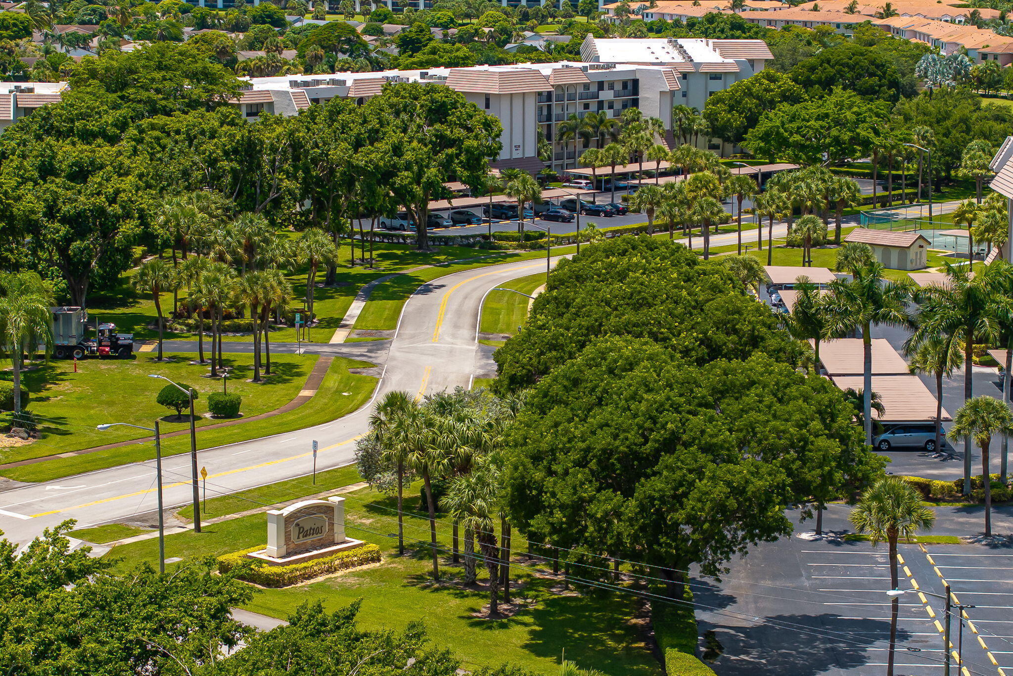 9220 Southwest 14th Street, Unit 3208 Boca Raton, FL 33428 - Photo 42 of 43 a view of a swimming pool with a yard