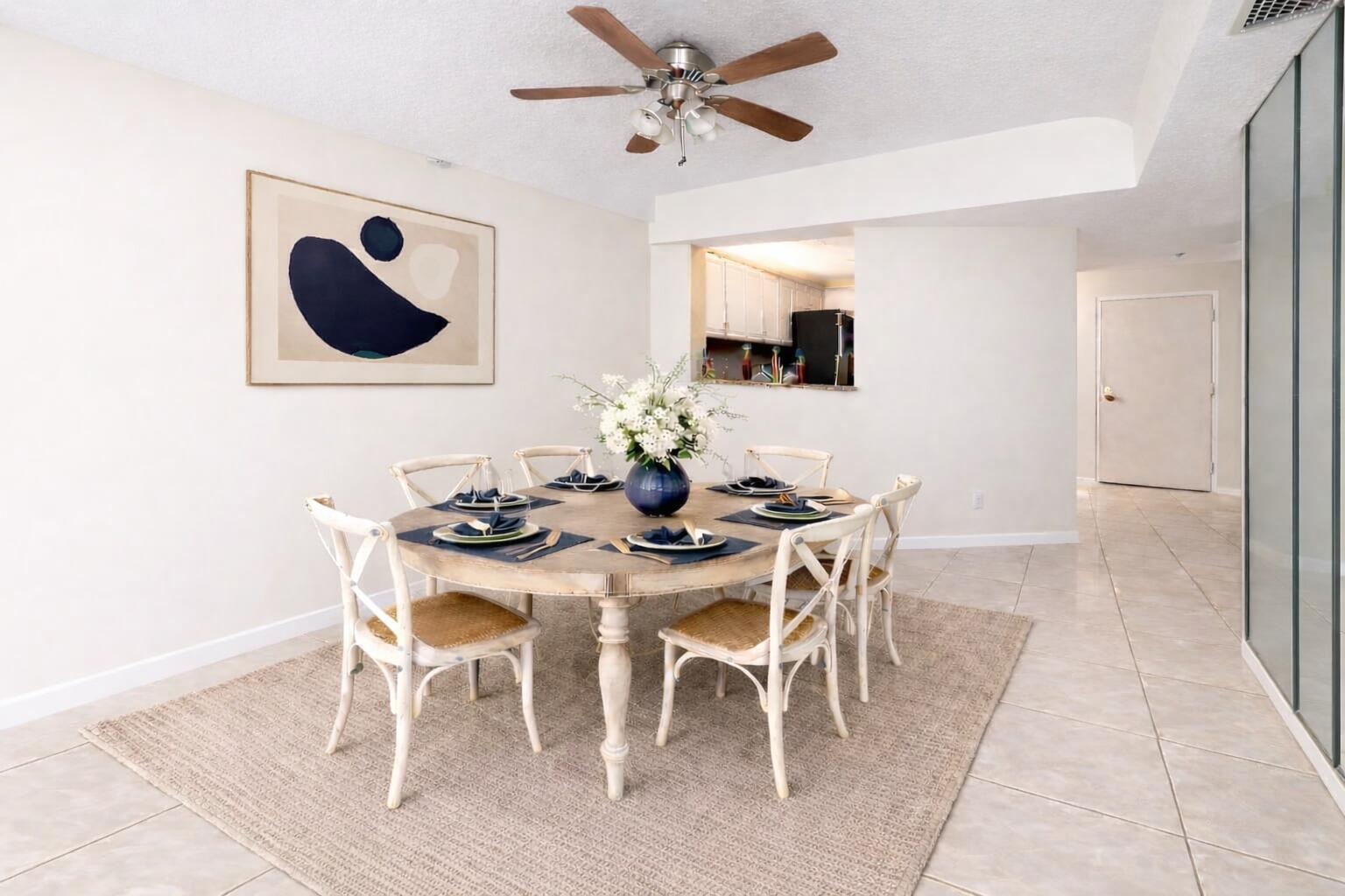 9220 Southwest 14th Street, Unit 3208 Boca Raton, FL 33428 - Photo 6 of 43 a view of a dining room with furniture and wooden floor