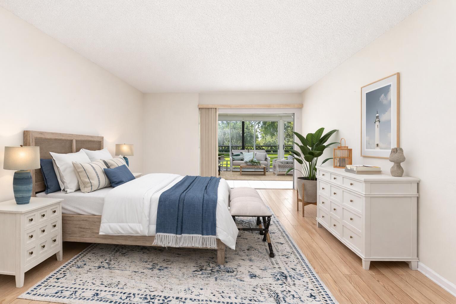 9220 Southwest 14th Street, Unit 3208 Boca Raton, FL 33428 - Photo 10 of 43 a living room with furniture and a large window