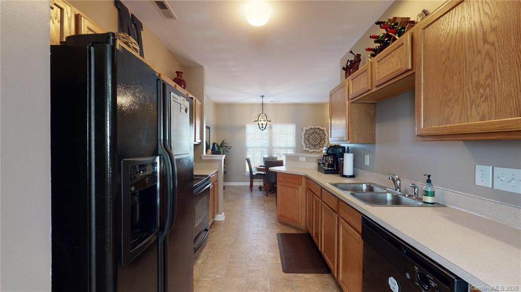 844 Dillard Road Rock Hill, SC 29730 - Photo 16 of 33 a kitchen with stainless steel appliances granite countertop refrigerator a sink and dishwasher
