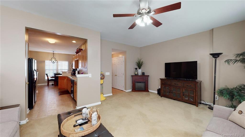 844 Dillard Road Rock Hill, SC 29730 - Photo 19 of 33 a living room with furniture and a flat screen tv