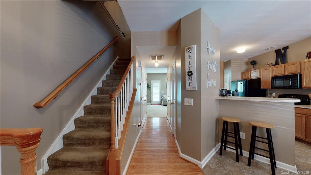 844 Dillard Road Rock Hill, SC 29730 - Photo 22 of 33 a view of entryway and hall with wooden floor