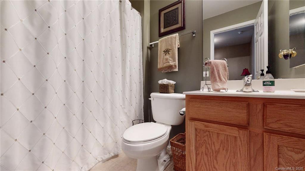 844 Dillard Road Rock Hill, SC 29730 - Photo 29 of 33 a bathroom with a toilet a sink and garden