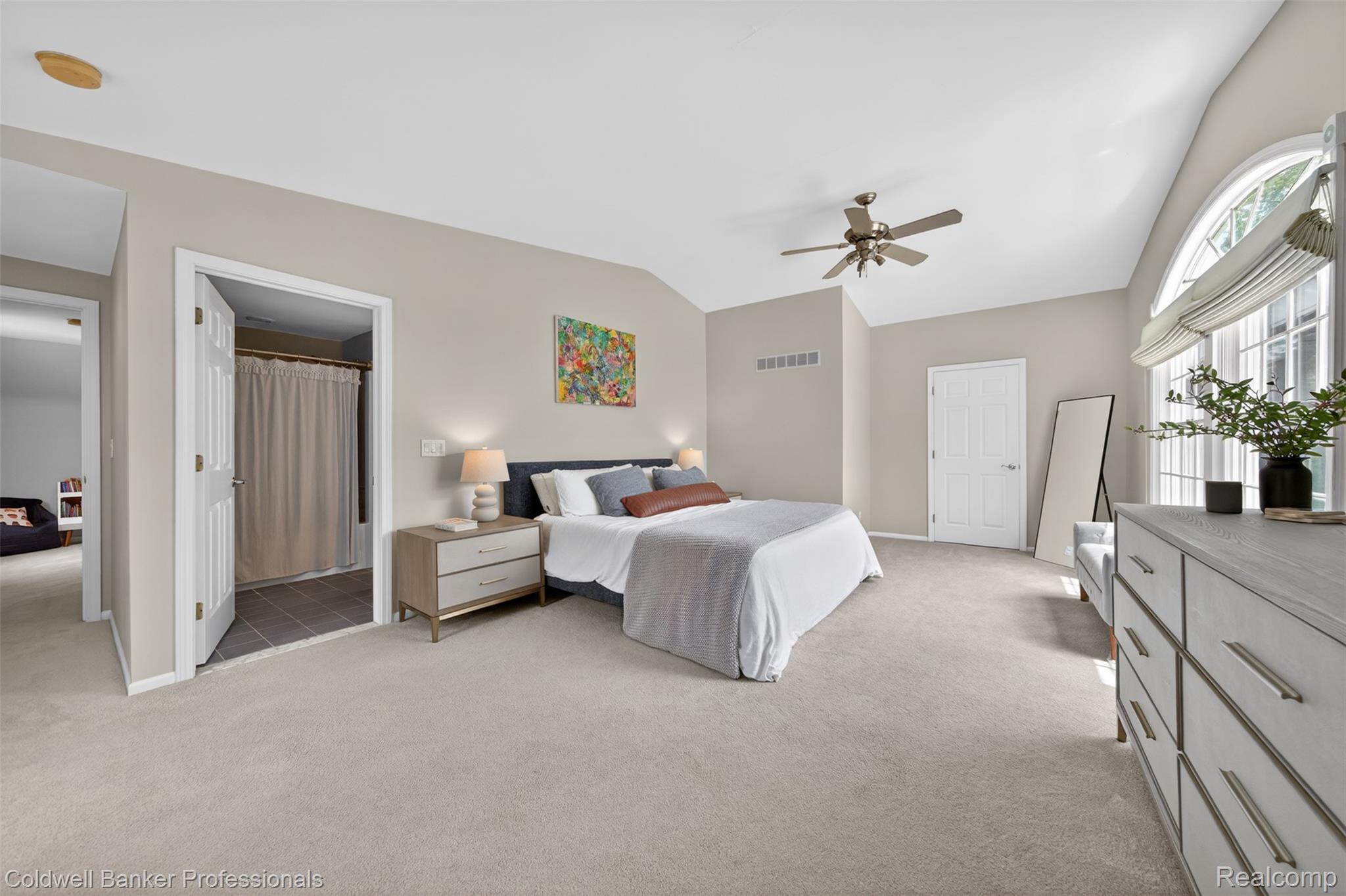 2666 Windemere Road Birmingham, MI 48009 - Photo 11 of 24 Carpeted interior room featuring a vaulted ceiling and a ceiling fan with integrated lighting