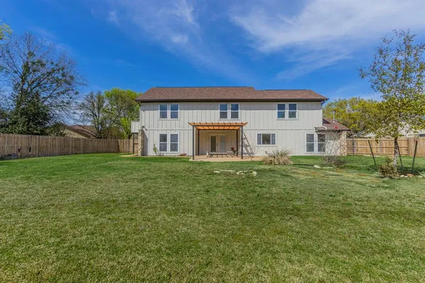 a house view with a garden space