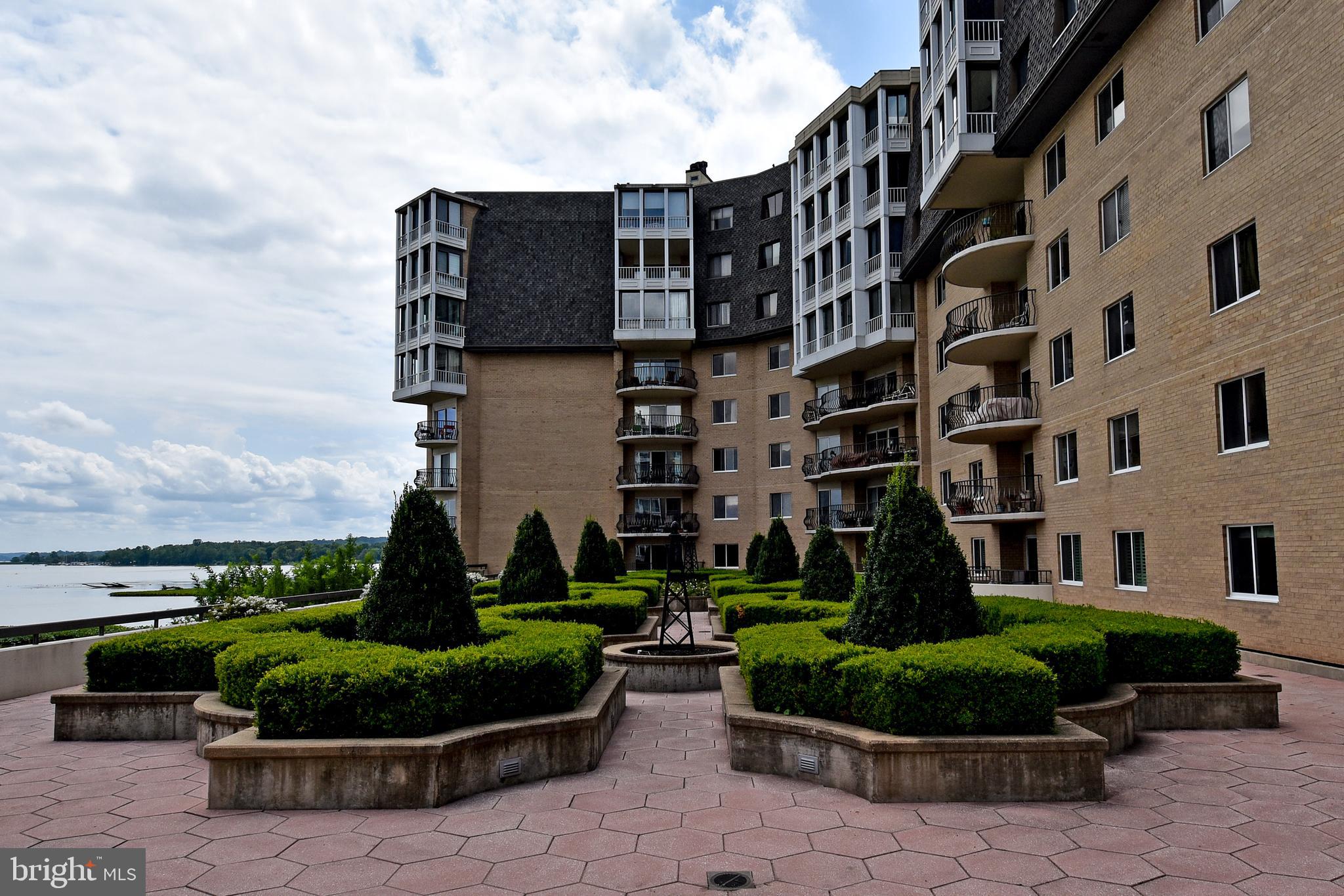 1250 South Washington Street, Unit 816 Alexandria, VA 22314 - Photo 41 of 58 a front view of a building with garden