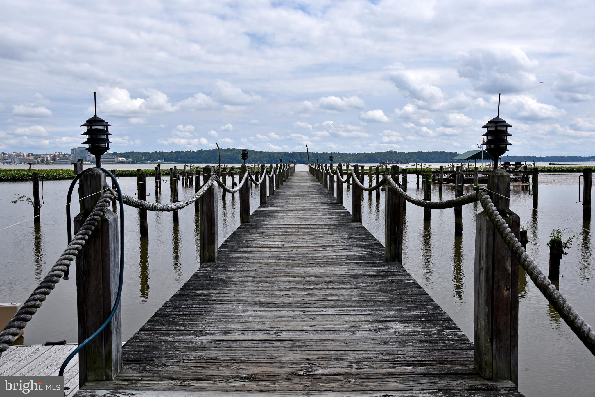 1250 South Washington Street, Unit 816 Alexandria, VA 22314 - Photo 44 of 58 a view of stairs and wooden floor