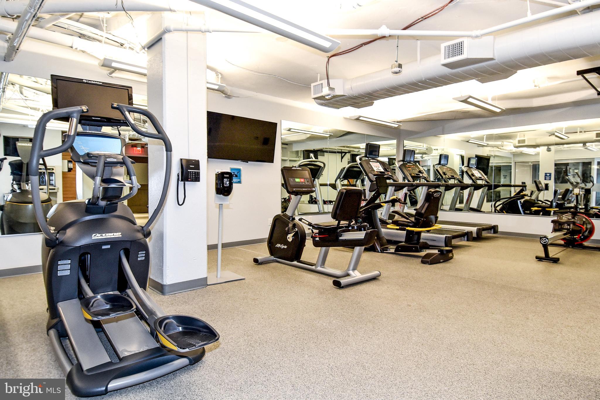 1250 South Washington Street, Unit 816 Alexandria, VA 22314 - Photo 45 of 58 a view of a room with gym equipment