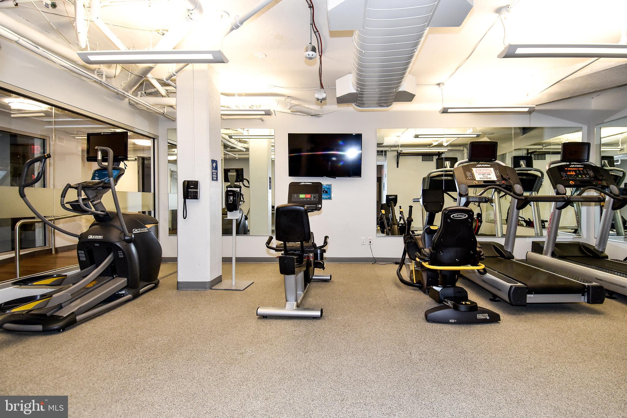 1250 South Washington Street, Unit 816 Alexandria, VA 22314 - Photo 46 of 58 a view of a room with gym equipment