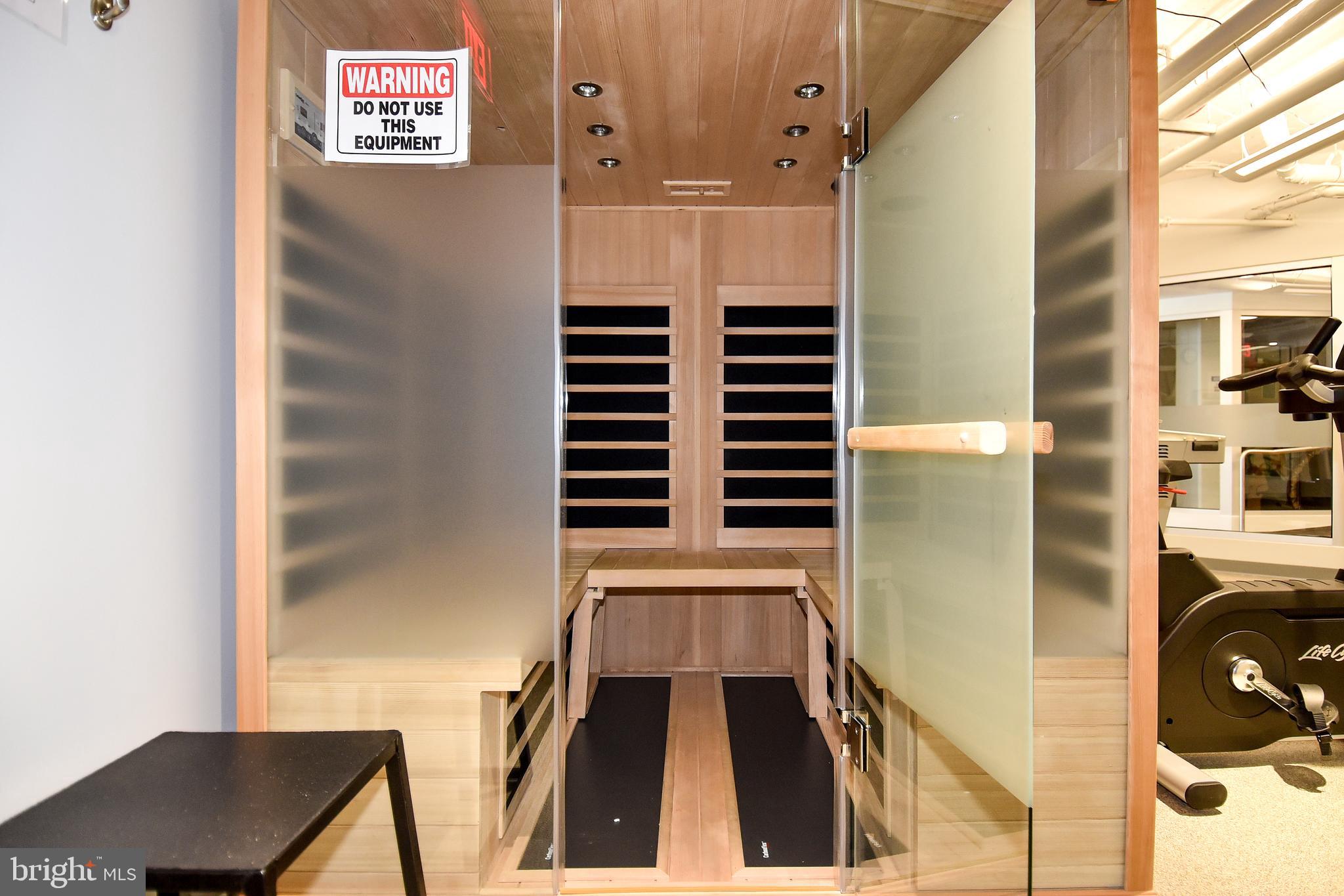 1250 South Washington Street, Unit 816 Alexandria, VA 22314 - Photo 48 of 58 a view of walk in closet with clothes and shoes