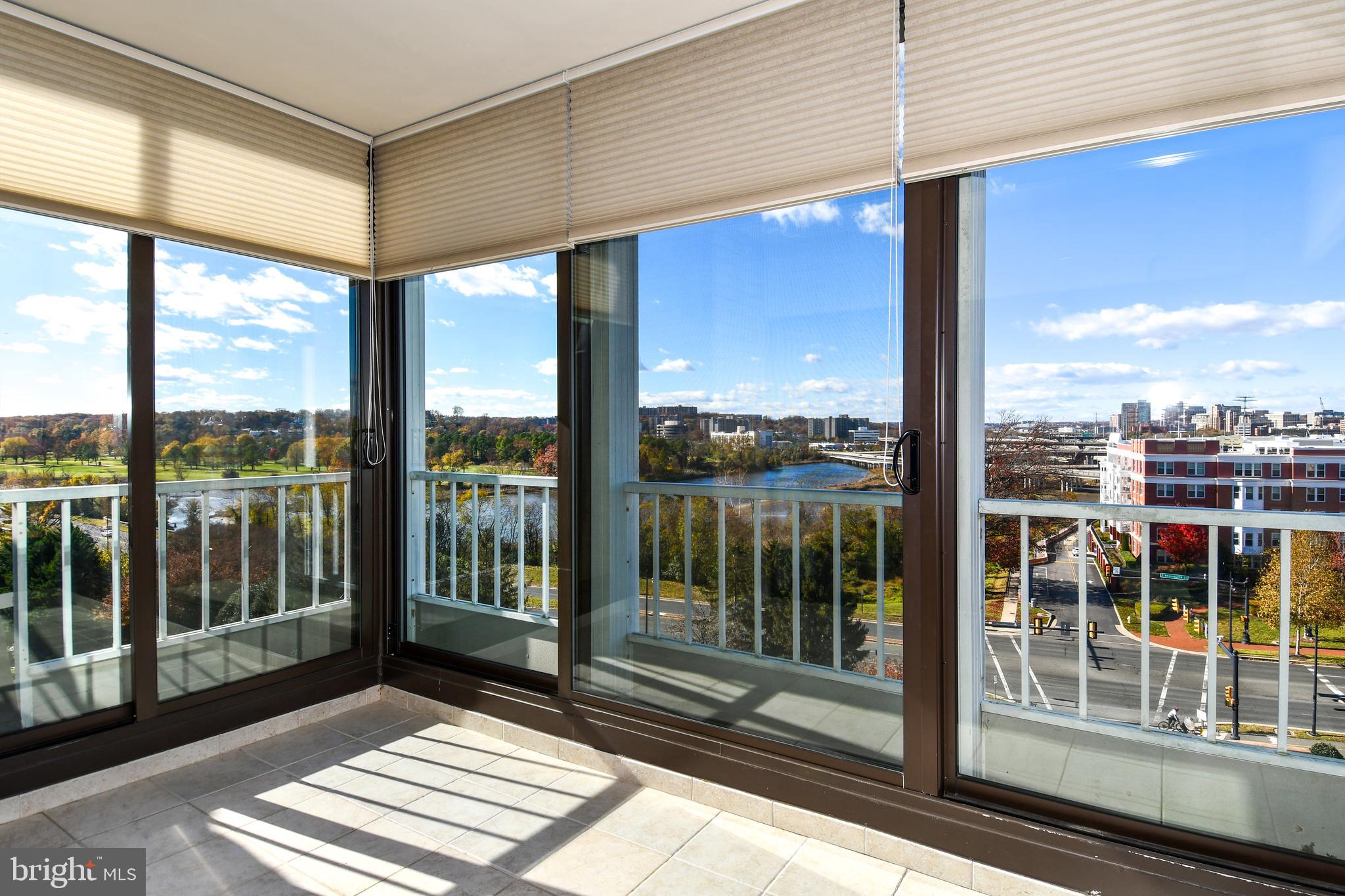1250 South Washington Street, Unit 816 Alexandria, VA 22314 - Photo 5 of 58 a view of a city from a balcony