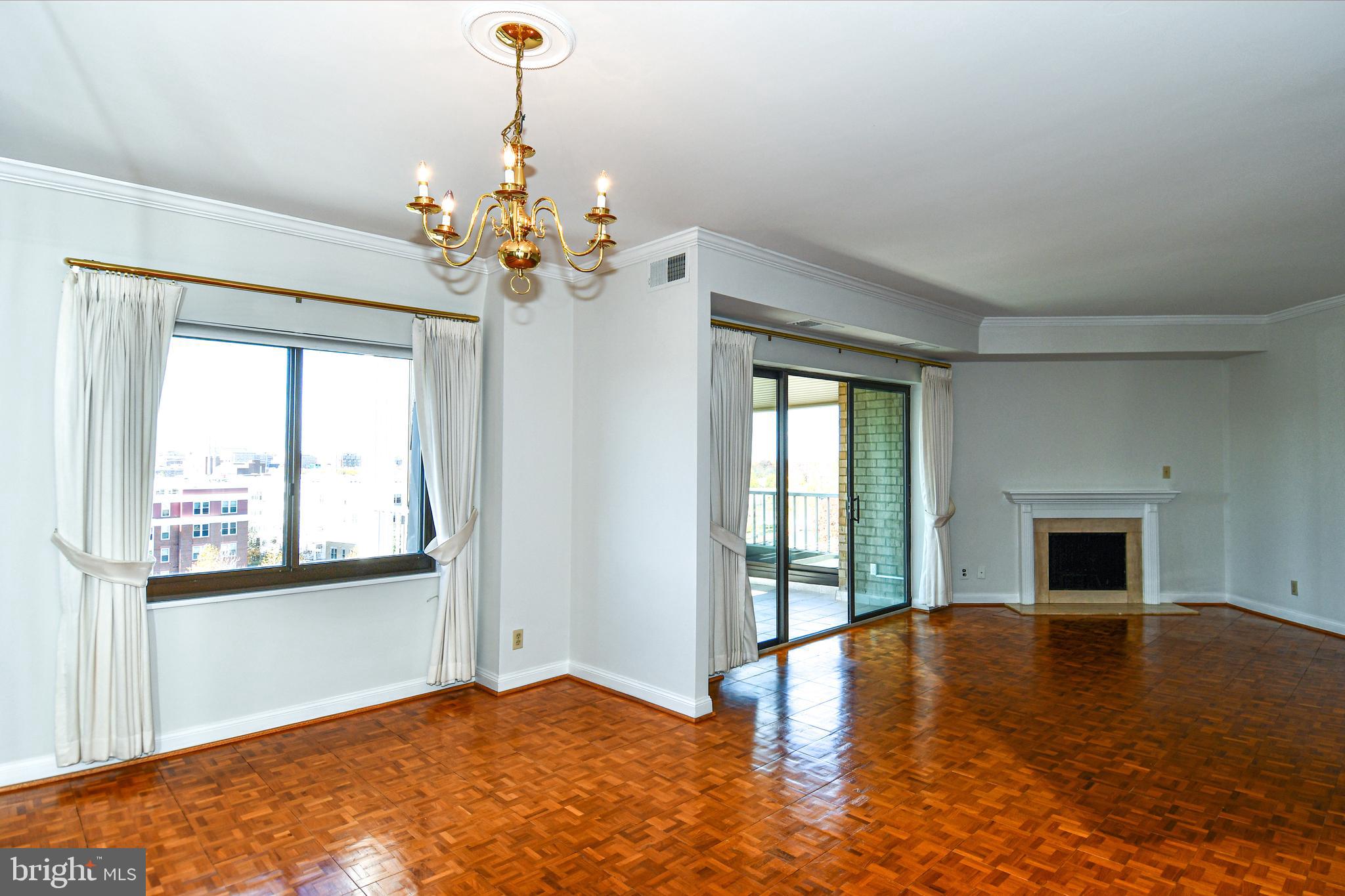 1250 South Washington Street, Unit 816 Alexandria, VA 22314 - Photo 9 of 58 a view of livingroom with window
