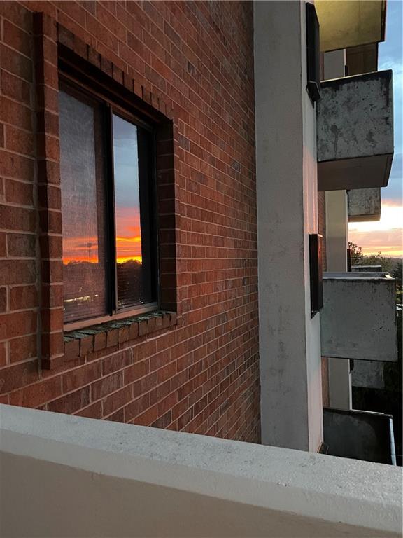 300 Johnson Ferry Road, Unit B605 Atlanta, GA 30328 - Photo 32 of 33 a view of a brick house with a large window