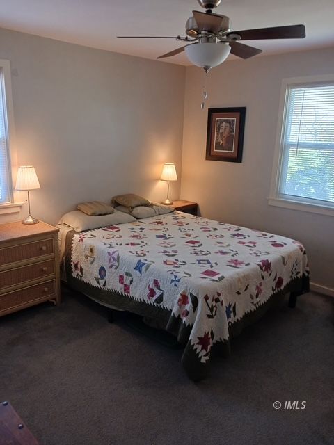 103 North Clay Street Independence, CA 93526 - Photo 15 of 25 a bedroom with a bed wall painting and a window