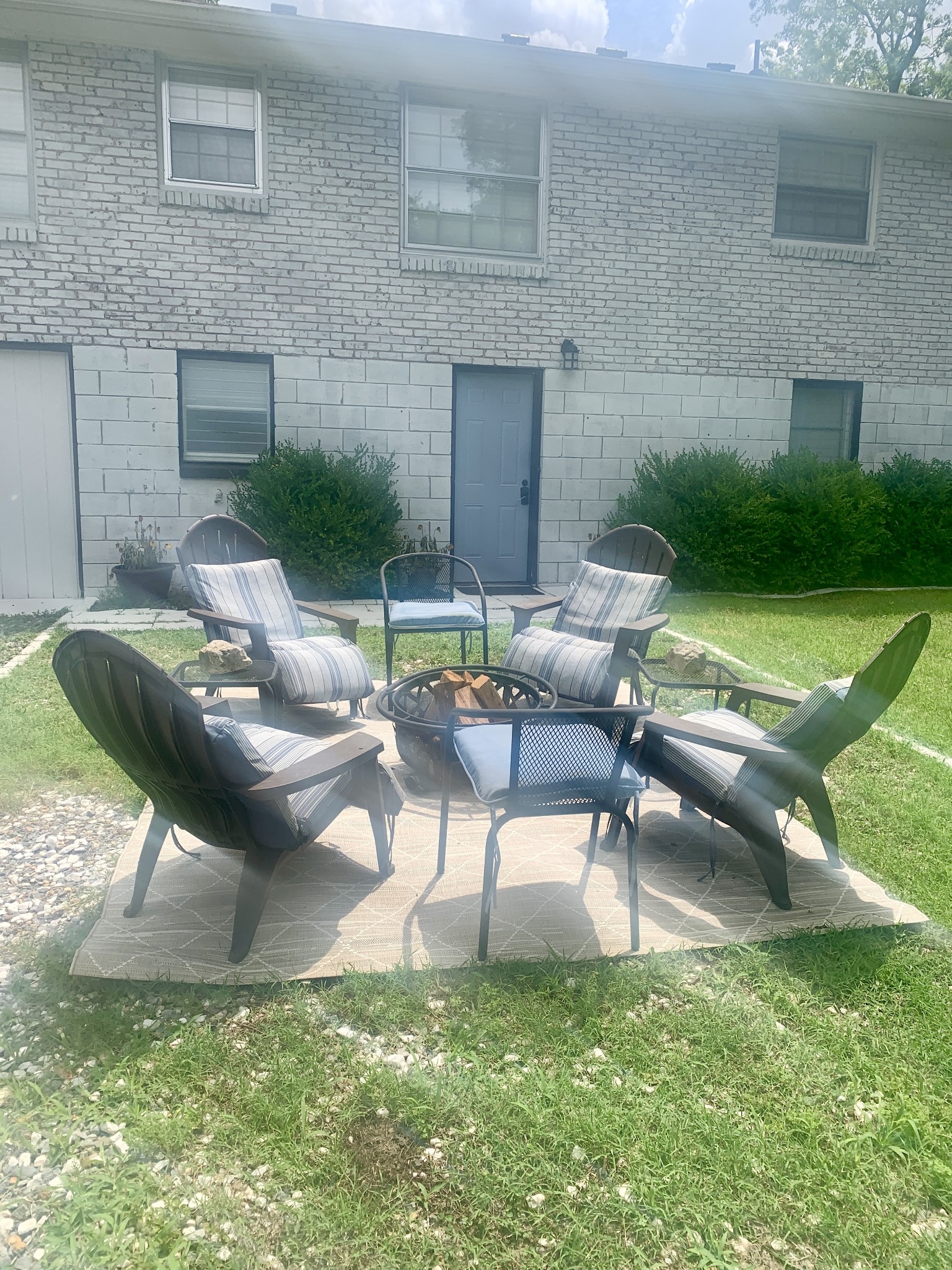 562 Walton Ferry Road Hendersonville, TN 37075 - Photo 4 of 24 a backyard of a house with fountain table and chairs