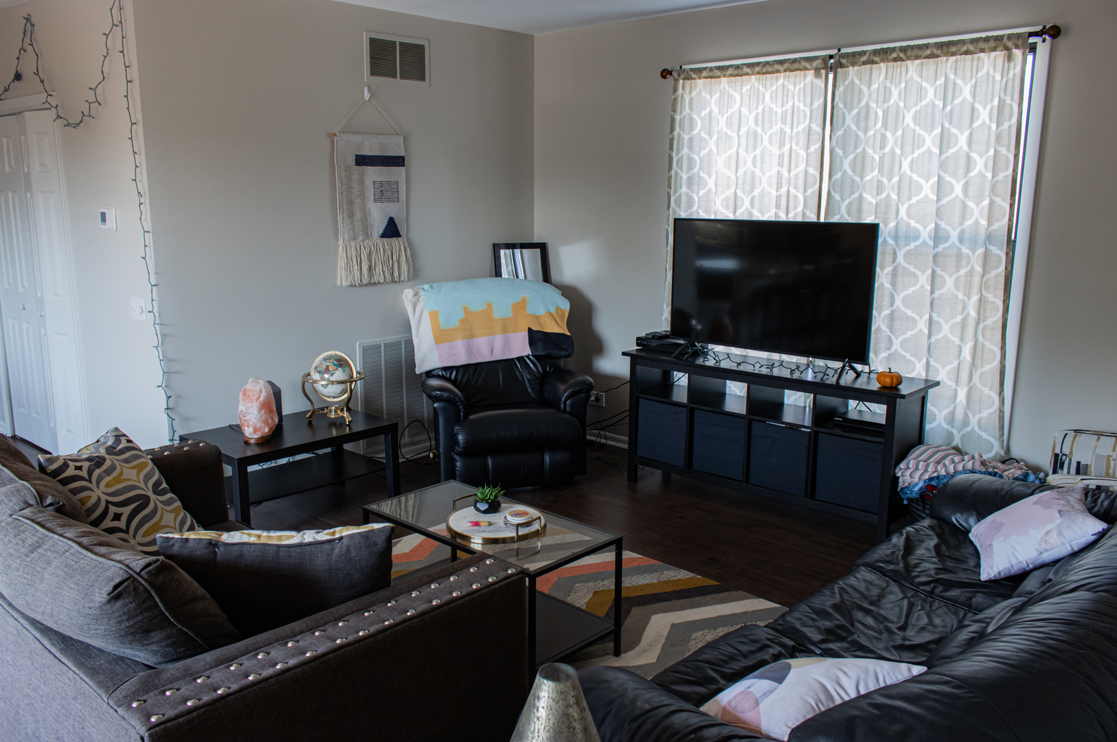 440 North Racine Avenue, Unit 2 Chicago, IL 60642 - Photo 2 of 20 a living room with furniture and a flat screen tv
