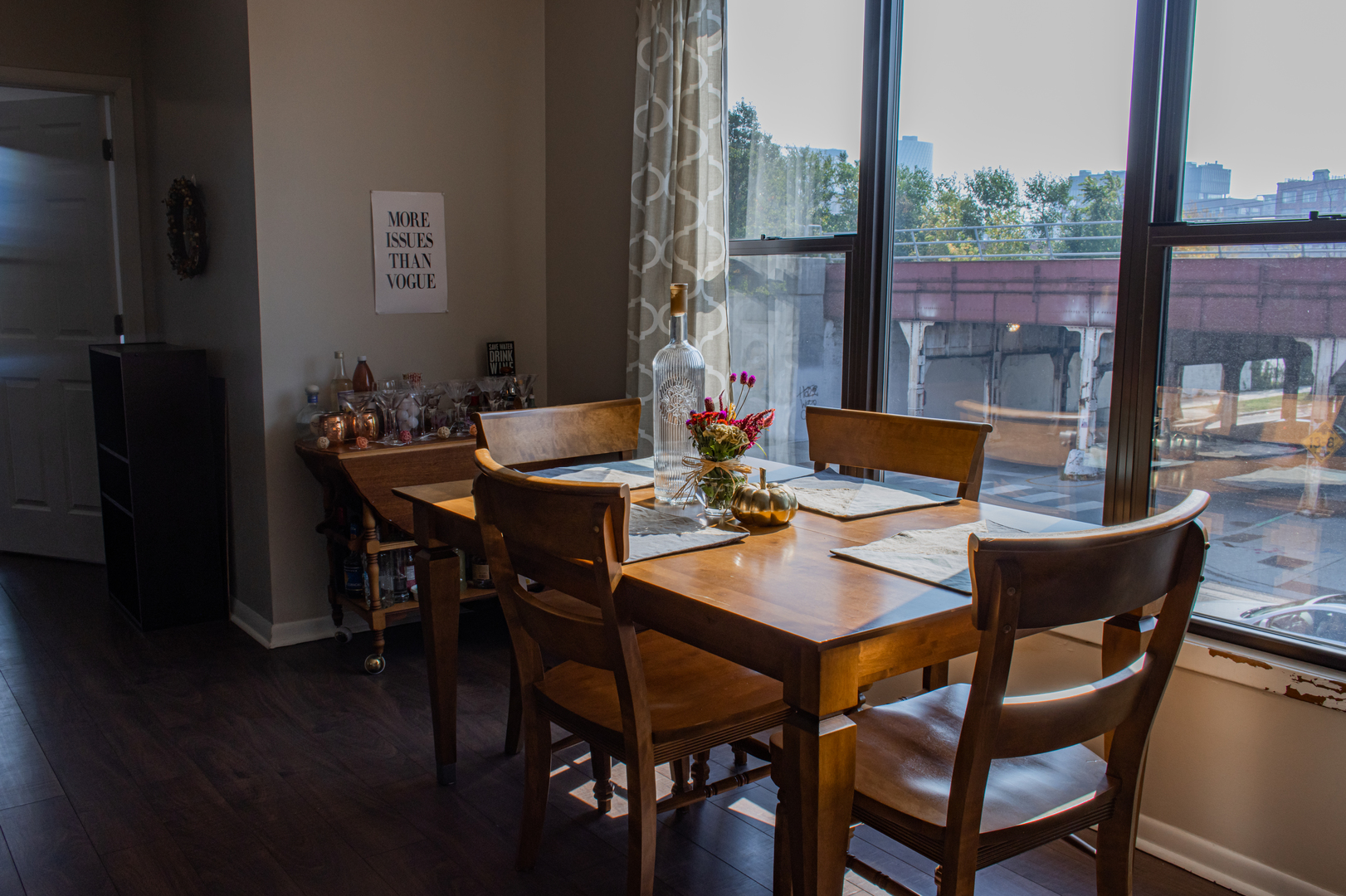440 North Racine Avenue, Unit 2 Chicago, IL 60642 - Photo 6 of 20 a view of a dining room with furniture and wooden floor