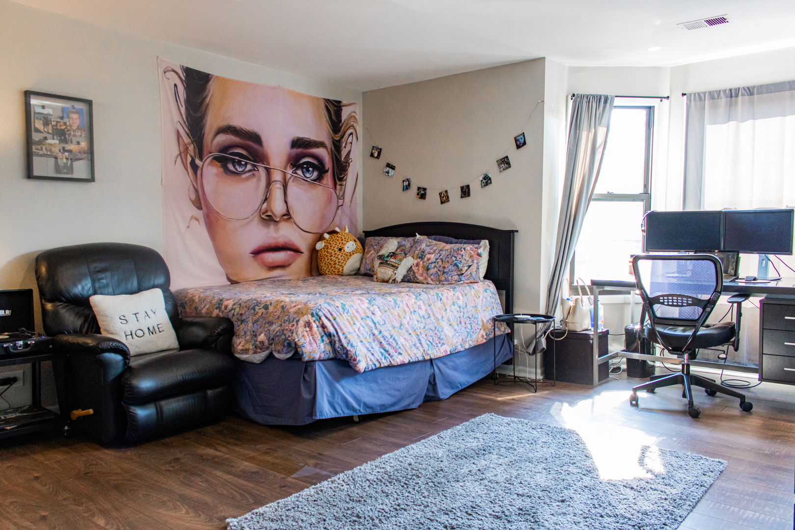 440 North Racine Avenue, Unit 2 Chicago, IL 60642 - Photo 9 of 20 a bedroom with a bed and wooden floor