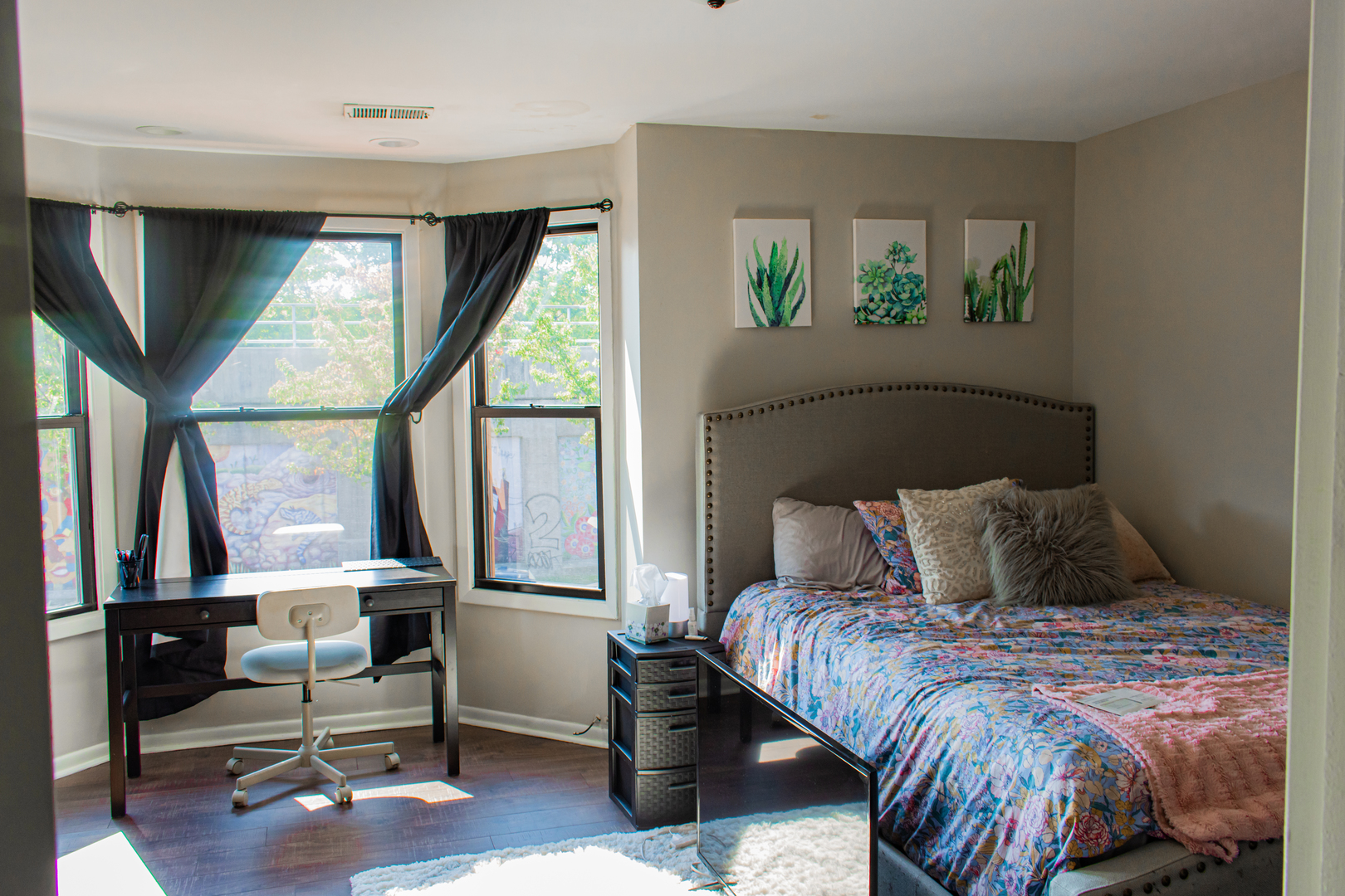 440 North Racine Avenue, Unit 2 Chicago, IL 60642 - Photo 10 of 20 a bedroom with a bed a window and walk in closet