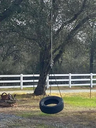 a view of a swimming pool with a yard