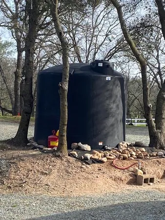 a view of a backyard of the house