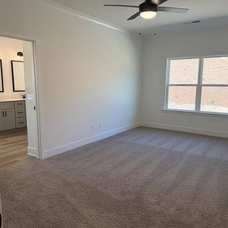 an empty room with a bathroom