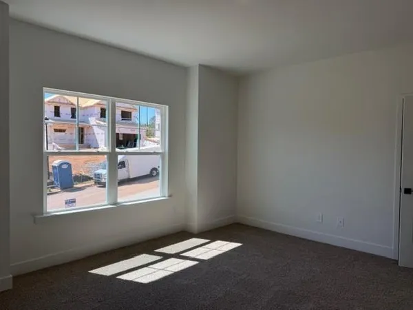 a view of an empty room with window