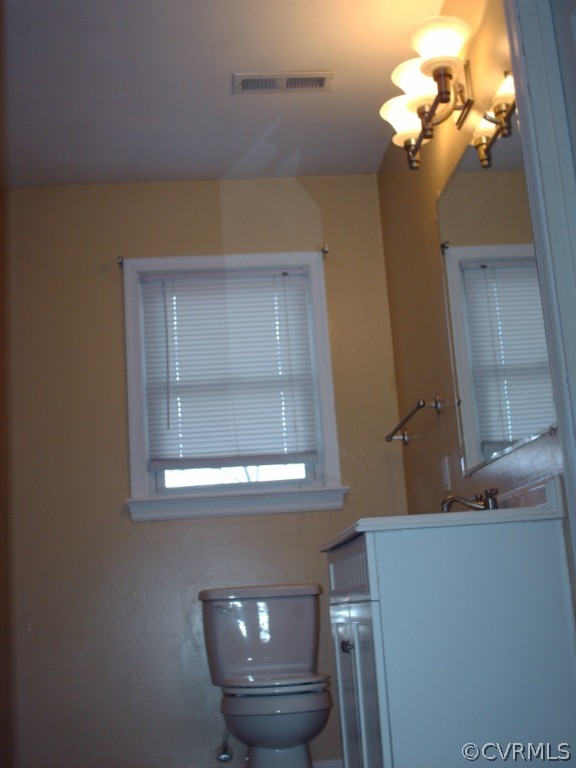 3560 Hemlock Road Chester, VA 23831 - Photo 12 of 16 a bathroom with a sink and a mirror