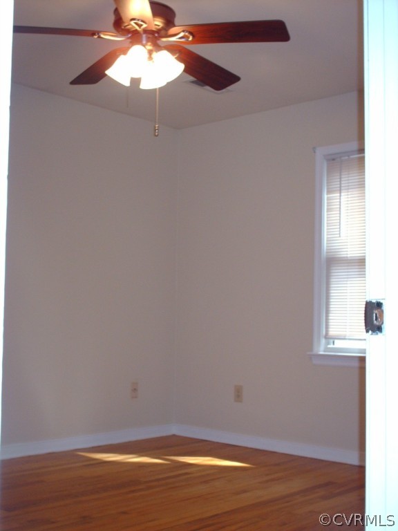 3560 Hemlock Road Chester, VA 23831 - Photo 8 of 16 a view of a small space with wooden floor and a window