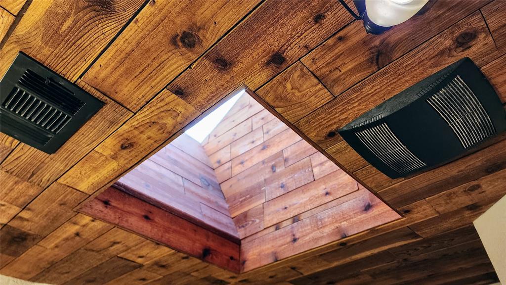 7505 Patsy Court Arlington, TX 76016 - Photo 21 of 38 Skylight over bath with Cedar trim.