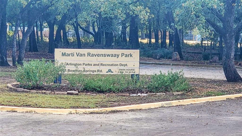 7505 Patsy Court Arlington, TX 76016 - Photo 37 of 38 Nearby Community Park with concrete road featuring curbs and view of wooded area.