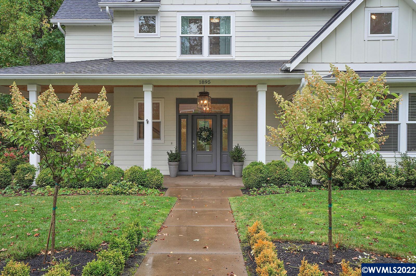 1895 Rio Vista Way South Salem, OR 97302 - Photo 4 of 42 a front view of a house with a yard