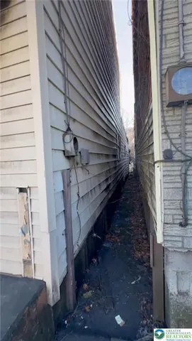 a view of a refrigerator in the backyard